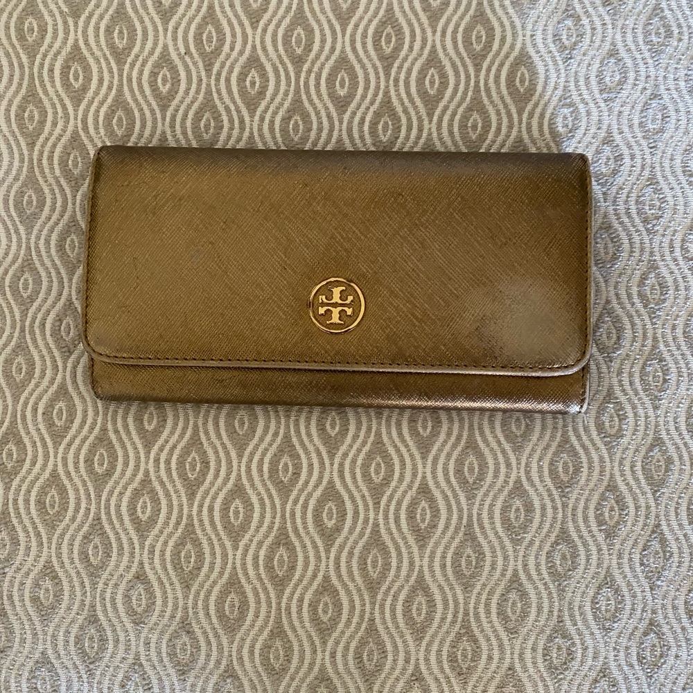 Tory Burch gold wallet. Some wear.